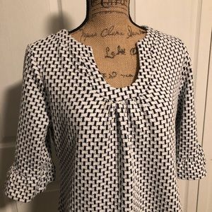 Ruffle sleeve tunic with neck detail